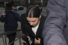 Chelsea and Australia soccer player Samantha Kerr arrives at Kingston Crown Court, in south west London, Tuesday, Feb. 11, 2025, where she is charged with alleged racially aggravated harassment of a police officer. (AP Photo/Kin Cheung)