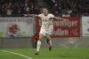 Leipzig's Benjamin Sesko celebrates scoring during the Germany Soccer Cup quarterfinal between RB Leipzig and VfL Wolfsburg at Red Bull Arena, Leipzig, Germany, Wednesday Feb. 26, 2025. (Jan Woitas/dpa via AP)