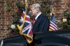 FILE - President Donald Trump arrives to meet British Prime Minister Theresa May before their meeting at Chequers, in Buckinghamshire, England, July 13, 2018. (Jack Taylor/Pool Photo via AP, File)