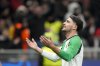 Feyenoord's Julian Carranza celebrates after scoring his side's first goal during Champions League, playoff second leg soccer match between AC Milan and Feyenoord, at the San Siro stadium in Milan, Italy, Tuesday, Feb.18, 2025. (AP Photo/Luca Bruno)