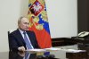 Russian President Vladimir Putin speaks to Governor of Sevastopol Mikhail Razvozhayev during their meeting via videoconference at the Novo-Ogaryovo state residence outside Moscow, Russia, Friday, Feb. 14, 2025. (Gavriil Grigorov, Sputnik, Kremlin Pool Photo via AP)