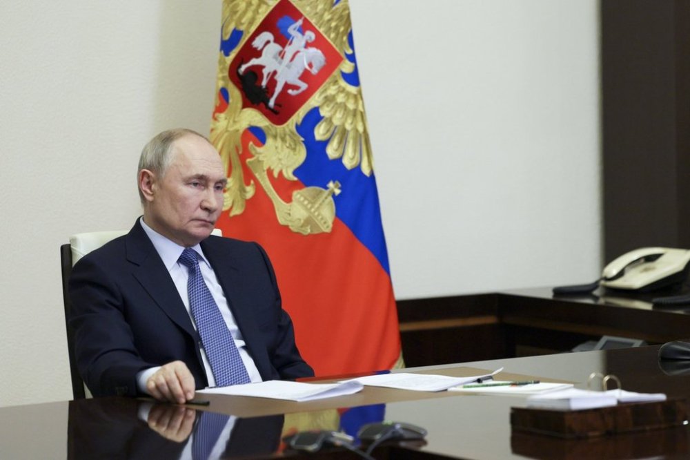 Russian President Vladimir Putin speaks to Governor of Sevastopol Mikhail Razvozhayev during their meeting via videoconference at the Novo-Ogaryovo state residence outside Moscow, Russia, Friday, Feb. 14, 2025. (Gavriil Grigorov, Sputnik, Kremlin Pool Photo via AP)