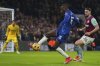 Chelsea's Nicolas Jackson, left, and West Ham's Max Kilman challenge for the ball during the English Premier League soccer match between Chelsea and West Ham United at Stamford Bridge stadium in London, Monday, Feb. 3, 2025. (AP Photo/Kirsty Wigglesworth)
