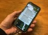 A person holds a cellphone showing an emergency alert. Southwestern British Columbia is recovering from the shock of Friday's earthquake, which has triggered some concern about the consistency and timing of alerts sent to residents. THE CANADIAN PRESS/Ian Young