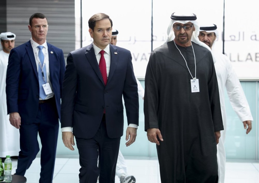 U.S. Secretary of State Marco Rubio, center, walks with United Arab Emirates President Sheikh Mohamed bin Zayed Al Nahyan as they meet at ADNEC Centre Abu Dhabi in Abu Dhabi, United Arab Emirates, Wednesday, Feb. 19, 2025. (Evelyn Hockstein/Pool Photo via AP)