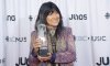Buffy Sainte-Marie celebrates her Juno for Indigenous Music Album of the Year at the Juno Awards in Vancouver, on Sunday, March, 25, 2018. THE CANADIAN PRESS/Jonathan Hayward