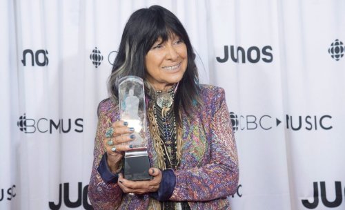 Buffy Sainte-Marie celebrates her Juno for Indigenous Music Album of the Year at the Juno Awards in Vancouver, on Sunday, March, 25, 2018. THE CANADIAN PRESS/Jonathan Hayward