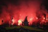 FILE - Marseille fans light flares during the French League One soccer match between Marseille and Saint-Etienne at the Velodrome stadium in Marseille, southern France, Sunday, Sept. 1, 2019. (AP Photo/Daniel Cole, file)