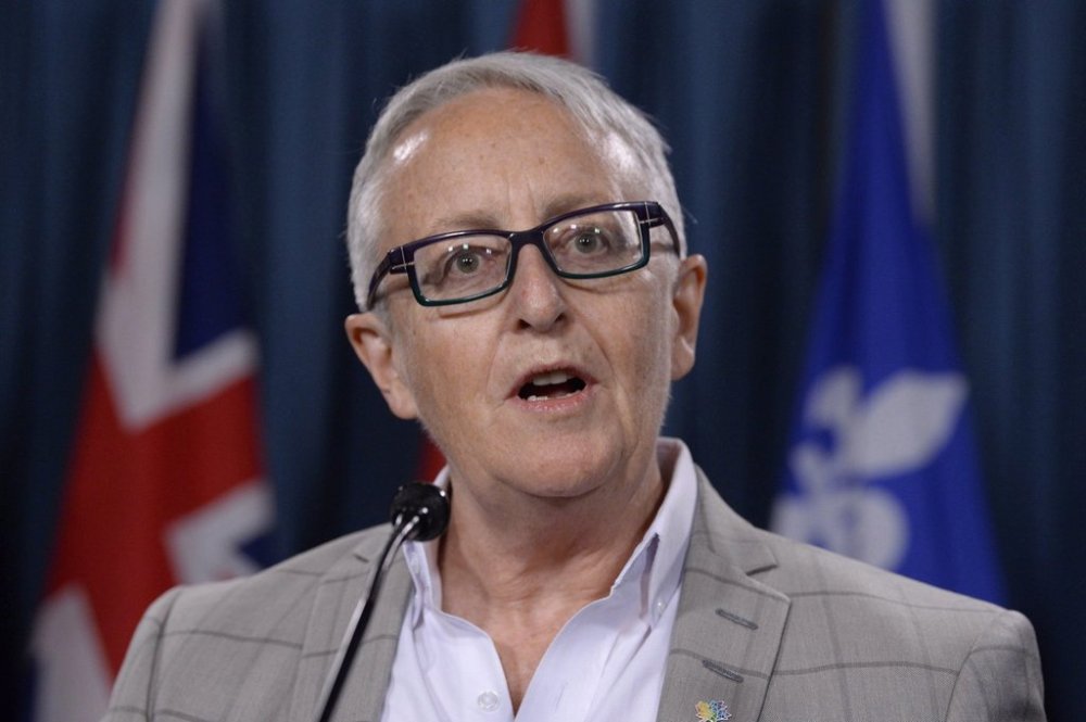 Egale Canada executive director Helen Kennedy addresses a news conference in Ottawa, Tuesday, Nov.28, 2017. Canada's primary LGBTQ+ advocacy organization is boycotting travel to the U.S., including United Nations events, over concerns about treatment at border crossings under the Trump administration. THE CANADIAN PRESS/Adrian Wyld