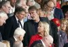 FILE - Jim Ratcliffe, center, in the stands during the English Premier League soccer match between Manchester United and Arsenal at the Old Trafford Stadium in Manchester, England, Sunday, May 12, 2024. (AP Photo/Dave Thompson, file)