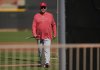 Cincinnati Reds manager Terry Francona walks across a field during spring training baseball practice at the team's training facility in Goodyear, Ariz., Saturday, Feb. 15, 2025. (AP Photo/Carolyn Kaster)