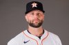 FILE - Houston Astros first base Christian Walker poses during photo day at the team's training facility during spring training baseball in West Palm Beach, Fla., Thursday, Feb. 20, 2025. (AP Photo/Gerald Herbert, File)