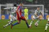 Ferencvaros' Adama Traore, left, challenges for the ball with Plzen's Vaclav Jemelka during a Europa League playoff first leg soccer match between Ferencvaros and Viktoria Plzen at the Groupama Arena stadium, in Budapest, Hungary, Thursday, Feb. 13, 2025. (AP Photo/Denes Erdos)