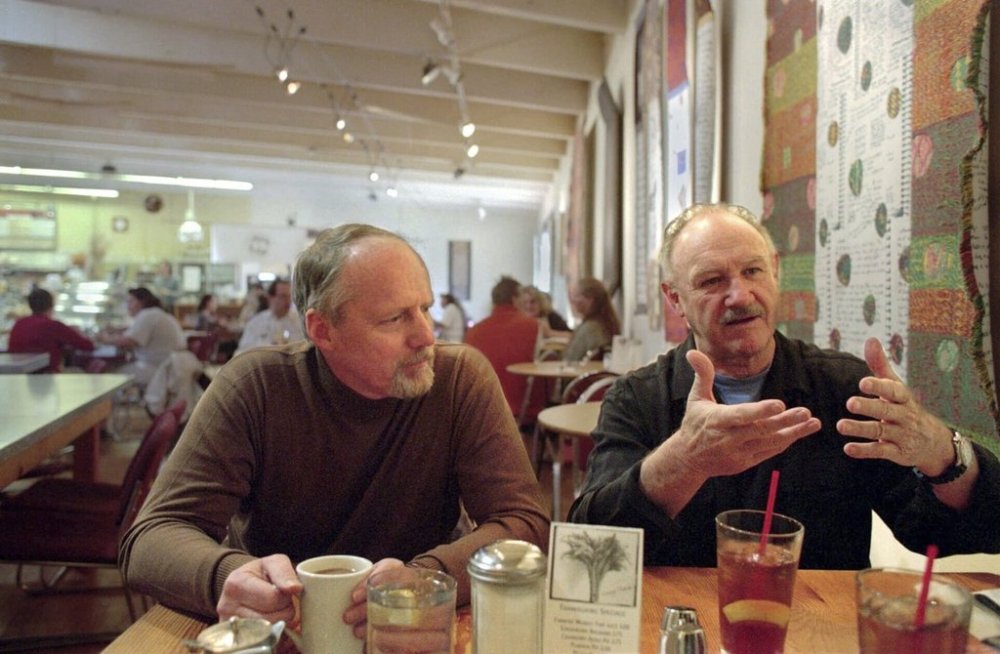 FILE - Gene Hackman, right, and long-time friend Daniel Lenihan, discuss their new book,