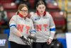 Northwest Territories Kerry Galusha and her daughter vice-skip Sydney Galusha call a shot in Scotties Tournament of Hearts curling action against Manitoba's Kate Cameron in Thunder Bay, Ont. on Saturday, February 15, 2025. THE CANADIAN PRESS/Frank Gunn