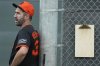 San Francisco Giants pitcher Justin Verlander watches other pitchers throw at the team's spring training baseball facility Thursday, Feb. 13, 2025, in Scottsdale, Ariz. (AP Photo/Ross D. Franklin)