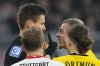 Dortmund's Julian Ryerson shouts to referee Daniel Siebert after receiving a red card during the German Bundesliga soccer match between Borussia Dortmund and VfB Stuttgart at the Signal-Iduna Park in Dortmund, Germany, Saturday, Feb. 8, 2025. (AP Photo/Martin Meissner)