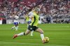 Australia defender Ellie Carpenter, foreground, dribbles during the first half of a group stage match against the United States in the SheBelieves Cup women's soccer tournament, Sunday, Feb. 23, 2025, in Glendale, Ariz. (AP Photo/Samantha Chow)