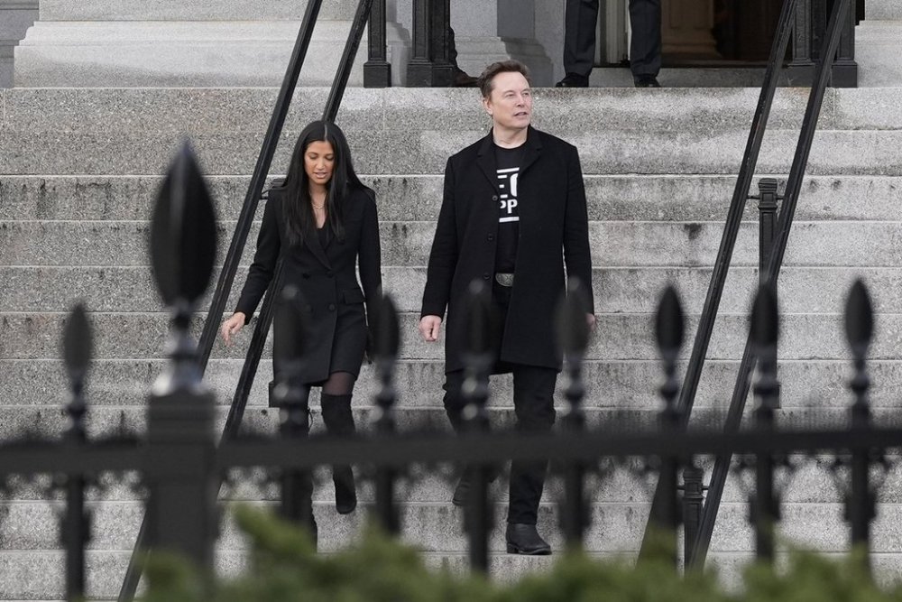 Elon Musk walks down the stairs from the Eisenhower Executive Office Building on the White House campus, Thursday, Feb. 13, 2025, in Washington. (Photo/Alex Brandon)