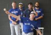Toronto Blue Jays pitcher Chris Bassitt, front, throws a pitching session during spring training in Dunedin Fla., on Sunday, Feb. 16, 2025. THE CANADIAN PRESS/Nathan Denette