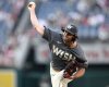 FILE - Washington Nationals relief pitcher Kyle Finnegan delivers during a baseball game against the Miami Marlins, Sept. 14, 2024, in Washington. (AP Photo/Nick Wass, File)
