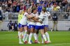 United States forward Michelle Cooper celebrates her first international goal with her teammates during the second half of a group stage match in the SheBelieves Cup women's soccer tournament against Australia, Sunday, Feb. 23, 2025, in Glendale, Ariz. (AP Photo/Samantha Chow)