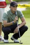 Richard Scott, of Kingsville, Ont., lines up his putt on the 18th hole to finish the second round of the Canadian Open golf championship at the Hamilton Golf and Country Club in Ancaster, Ontario on Friday Sept. 8, 2006. THE CANADIAN PRESS/Frank Gunn