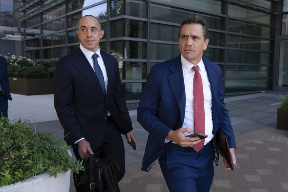 FILE _ Former President Donald Trump attorneys Emil Bove, left, and Todd Blanche leave the U.S. Federal Courthouse, after a hearing, Sep. 5, 2024, in Washington. (AP Photo/Jose Luis Magana, File)