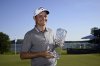 FILE - Britain's Dale Whitnell holds the trophy after winning the PGA European Tour, Scandinavian Mixed, at Ullna golf course outside Stockholm, Sweden, Sunday June 11, 2023, file. (Anders Wiklund/TT via AP, file)