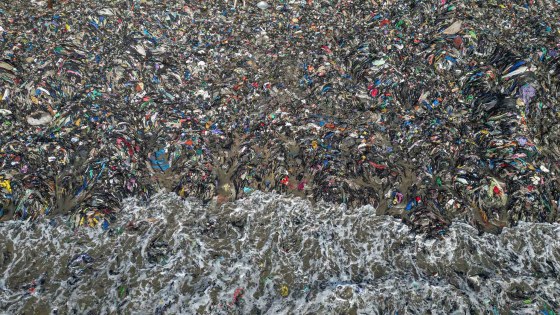 A 2024 photo of textile waste polluting the beach shore at Jamestown in Accra, Ghana. (Misper Apawu / The Associated Press)