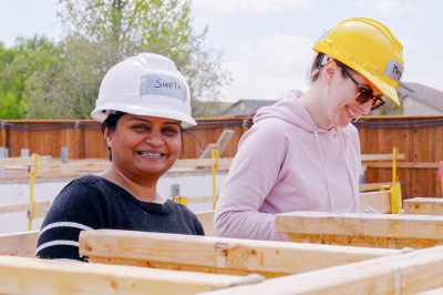 Employees at Access Credit Union volunteer at a Habitat for Humanity build.