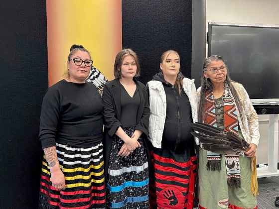 From left: Melissa Robinson, cousin of Morgan Harris; Elle Harris, daughter of Morgan Harris; Jorden Myran, sister of Marcedes Myran; and Elder Geraldine Shingoose (Brittany Hobson / The Canadian Press)