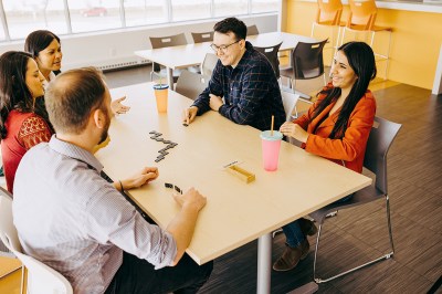Payworks employees playing games during a break in the office.