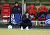 Hertha coach Cristian Fiel crouches on the ground during their German Bundesliga 2 soccer match against Fortuna Duesseldorf at the Merkur Spiel-Arena in Duesseldorf, Germany, Saturday, Feb. 15, 2025. (Roland Weihrauch/dpa via AP)