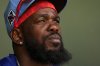 Texas Rangers right fielder Adolis García sits in the dugout before a spring training baseball game against the Chicago Cubs, Friday, Feb. 28, 2025, in Surprise, Ariz. (AP Photo/Lindsey Wasson)