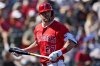 Los Angeles Angels' Mike Trout looks towards the mound after striking out against the San Francisco Giants' during the first inning of a spring training baseball game, Monday, Feb. 24, 2025, in Tempe, Ariz. (AP Photo/Matt York)