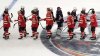 Canada, bottom, and United States, top, players shake hands following an overtime period of the 4 Nations Face-Off championship hockey game, Thursday, Feb. 20, 2025, in Boston. THE CANADIAN PRESS/AP/Charles Krupa