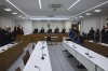 Judge Doris Husch, center, presides over the chamber court trial against four alleged Hamas members suspected of organizing weapons caches across Europe, in Berlin, Tuesday Feb. 25, 2025. (Fabrizio Bensch/Pool via AP)