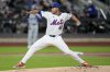 FILE - New York Mets pitcher Jose Quintana throws against the Los Angeles Dodgers during the first inning in Game 4 of a baseball NL Championship Series, Thursday, Oct. 17, 2024, in New York. (AP Photo/Ashley Landis, File)