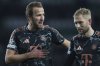 Bayern's Harry Kane talks to Konrad Laimer after the Champions League play off first leg soccer match between Celtic Glasgow and Bayern Munich at the Celtic Park Stadium in Glasgow, Scotland, Wednesday, Feb. 12, 2025. (AP Photo/Scott Heppell)
