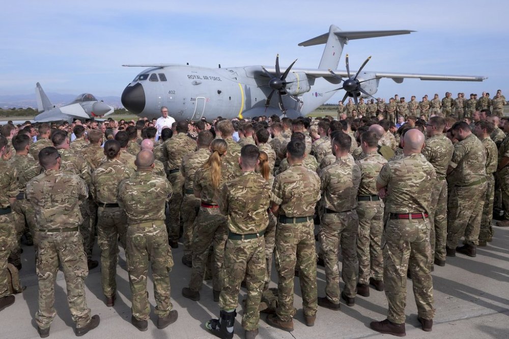 FILE - Britain's Prime Minister Keir Starmer speaks to soldiers at the RAF base in Akrotiri, Cyprus, on Dec. 10, 2024.(AP Photo/Kirsty Wigglesworth, Pool File)