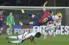 Barcelona's Gavi, centre, challenges for the ball with Rayo's Abdul Mumin, bottom, during a Spanish La Liga soccer match between Barcelona and Rayo Vallecano at the Lluis Companys Olympic Stadium in Barcelona, Spain, Monday, Feb. 17, 2025. (AP Photo/Joan Monfort)
