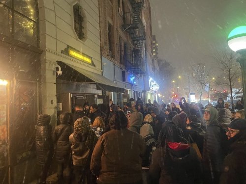 People gather outside the Bowery Ballroom where Paul McCartney’s surprise show was held in New York, Tuesday, Feb. 11, 2025. (AP Photo/Jake Coyle)