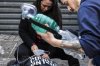 Sarah Greig, Director of Substance Use and Mental Health,  and Community Health Worker Noel Glover, work to reverse an overdose at the Moss Park consumption and treatment service, in Toronto, Friday, Jan. 17, 2025. THE CANADIAN PRESS/Chris Young