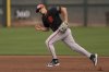 San Francisco Giants shortstop Willy Adames runs to cover third base during spring training baseball practice at the team's training facility, Monday, Feb. 17, 2025, in Scottsdale, Ariz. (AP Photo/Carolyn Kaster)
