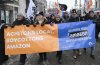 People take part in a protest in Montreal, Saturday, Feb. 15, 2025, against Amazon's decision to shutter its seven warehouses in Quebec, including what was Canada's only unionized Amazon facility. THE CANADIAN PRESS/Graham Hughes