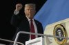 President Donald Trump gestures as he boards Air Force 1 at the Naval Air Station Joint Reserve Base in New Orleans, Sunday, Feb. 9, 2025. THE CANADIAN PRESS/AP/Ben Curtis