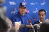Los Angeles Dodgers two-way player Shohei Ohtani speaks to reporters during spring training baseball practice, Thursday, Feb. 20, 2025, in Phoenix. (AP Photo/Ashley Landis)