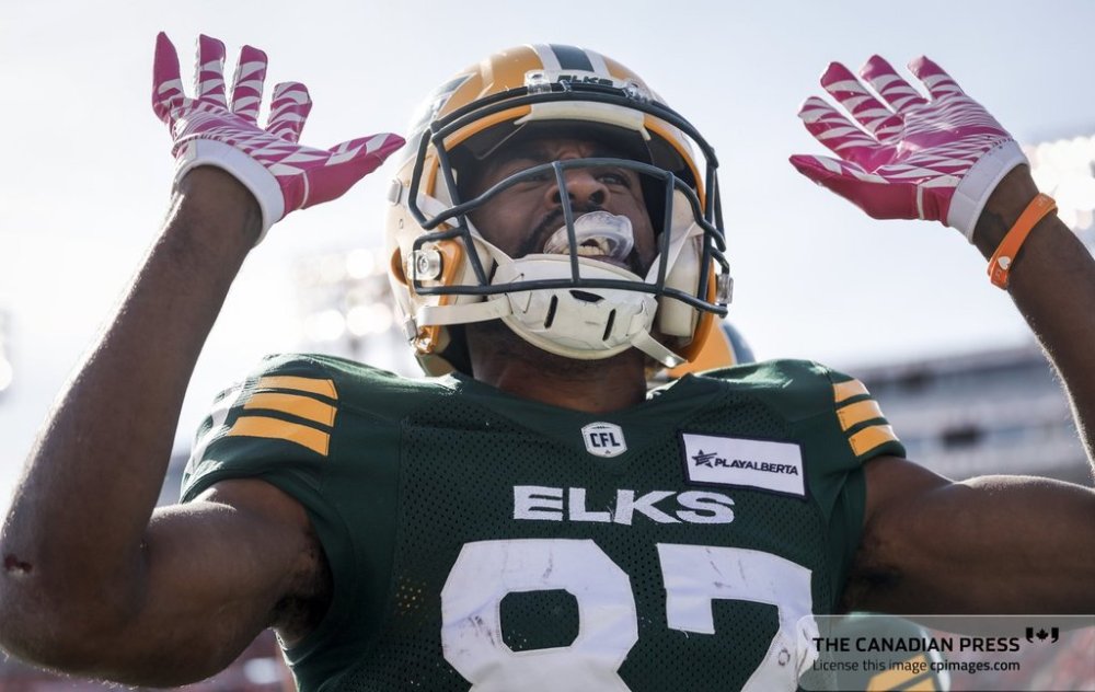 Edmonton Elks' Eugene Lewis celebrates his touchdown during first half CFL football action against the Calgary Stampeders in Calgary, Saturday, Oct. 12, 2024.CFL free agency continues Wednesday with all nine teams expected to make moves after a busy opening day Tuesday. THE CANADIAN PRESS/Jeff McIntosh