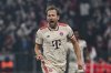 Munich's Harry Kane celebrates after scoring the opening goal during the Champions League round of 16 first leg soccer match between FC Bayern Munich and Bayer 04 Leverkusen in Munich, Germany, Wednesday, March 5, 2025. (Peter Kneffel/dpa via AP)
